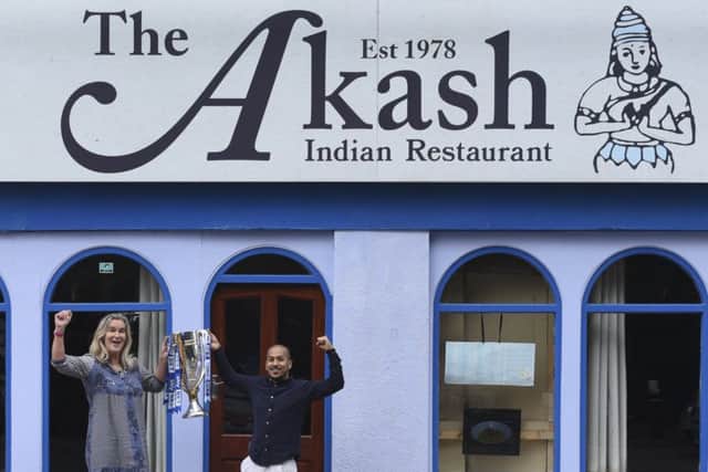 Clare Martin, director of Portsmouth in the Community, and Faz Ahmed, from The Akash. Picture: Roger Forman.