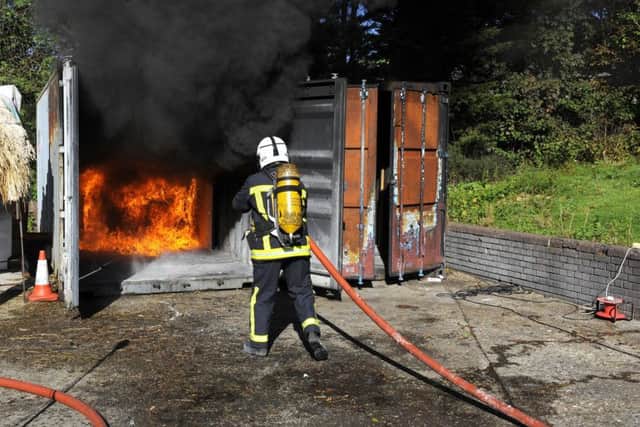 A 'live burn' demonstration by Hampshire Fire & Rescue Arson Task Force      Picture:  Malcolm Wells (170922-2843)