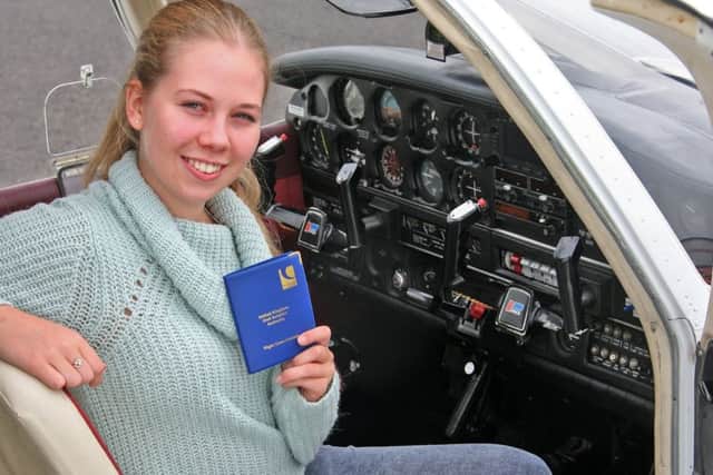 Ariane Edge in a Piper PA 28