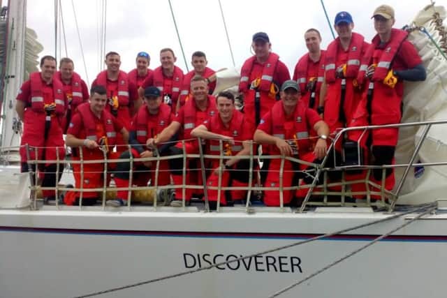 The crew on board Discoverer prior to setting off from Haslar Marina