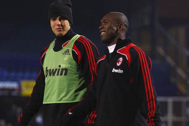 Clarence Seedord, right, with AC Milan team-mate Kaka at Fratton Park in 2008