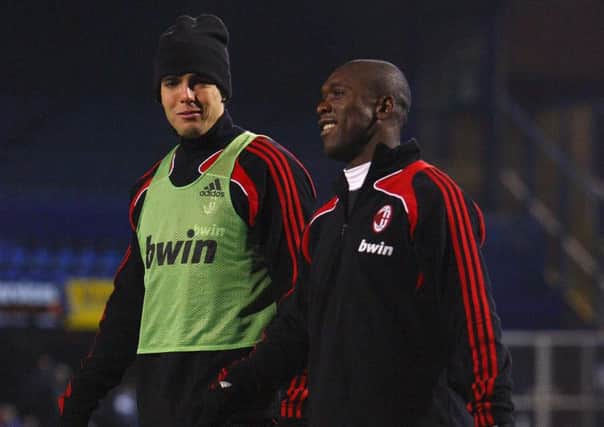 Clarence Seedord, right, with AC Milan team-mate Kaka at Fratton Park in 2008