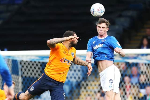 Oli Hawkins was used as a makeshift centre-back in the loss against the Latics. Picture: Joe Pepler