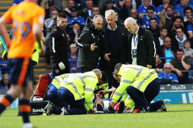 Nathan Thompson receives treatment after clashing heads with Drew Talbot against Oldham. Picture: Joe Pepler
