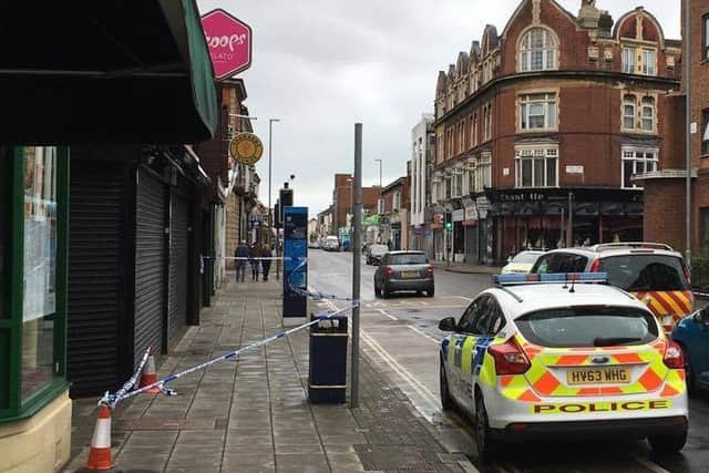 Police outside an alleyway next to Scoops, in Elm Grove, Southsea, Portsmouth.