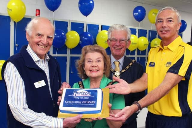 From left: Peter Crane (chairman), mayor Elaine Shimbart, consort Gerald Shimbart and Howard Broad (chief executive), with a celebration cake to mark the 20th anniversary of Havant Leisure Centre