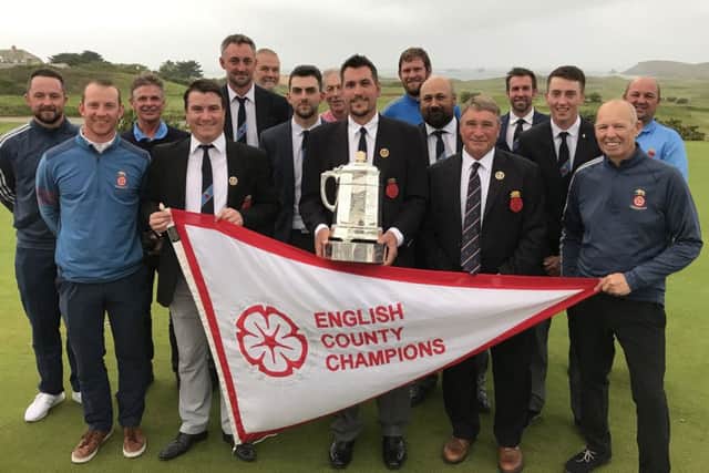 Hampshire pose with the County Championship trophy at Trevose Golf Club. Picture: Andrew Griffin