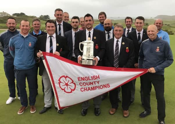 Hampshire pose with the County Championship trophy at Trevose Golf Club. Picture: Andrew Griffin