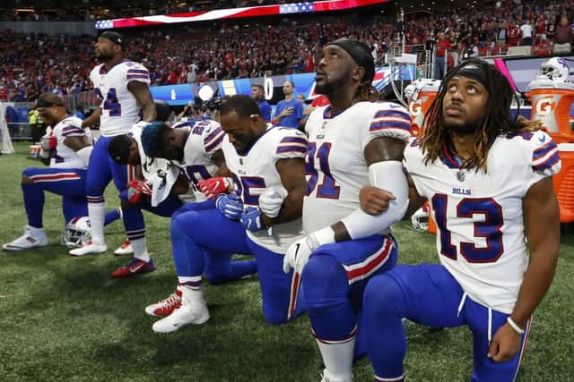 Buffalo Bills players 'take a knee' during the national anthem before the first half of an NFL game against the Atlanta Falcons on Sunday.                                Picture: AP Photo/John Bazemore