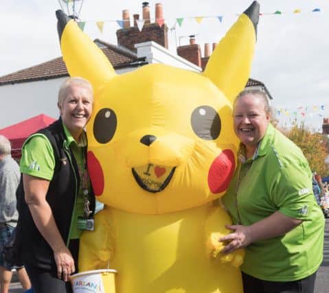 Sharon Noble, Picatou and Rachel Webber raising money at the village fair.
