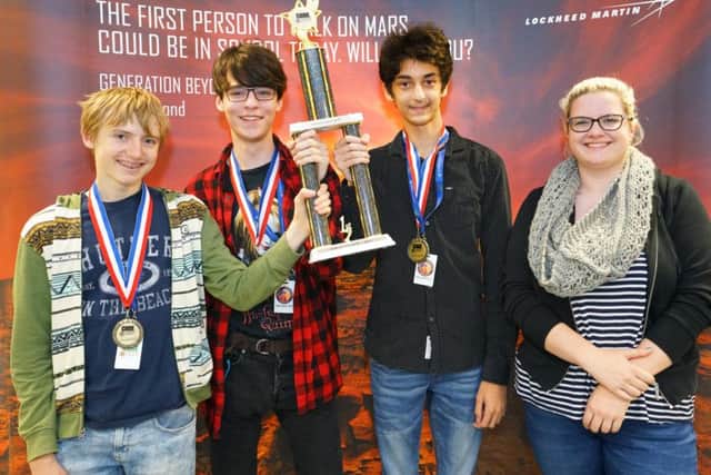 Winners Charles Loveman, Connor Goddard and David Zhorzholadze with teacher Victoria Rudd