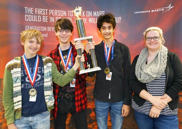Winners Charles Loveman, Connor Goddard and David Zhorzholadze with teacher Victoria Rudd