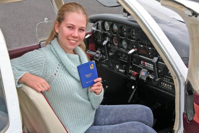 Ariane Edge in a Piper PA 28