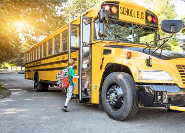 At what age should children be allowed to travel to school without an adult?