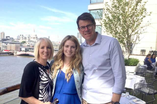 Olivia Ponsford with her parents Mandy and Dean