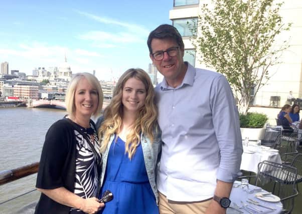 Olivia Ponsford  with her parents Mandy and Dean