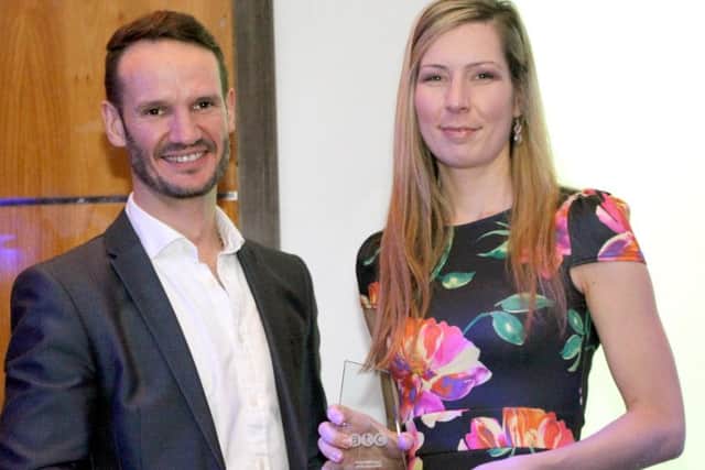 ATC Chairman Roy Allkin presents Tatiana Poliakova with her award