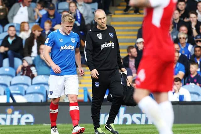 Damien McCrory limps off against Fleetwood. Picture: Joe Pepler
