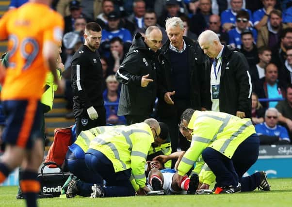 Nathan Thompson is stretchered off on Saturday. Picture: Joe Pepler