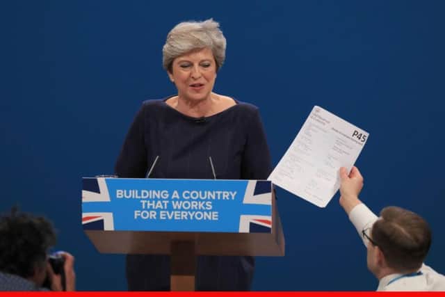 Comedian Lee Nelson disrupts Theresa May's speech with a  'P45'