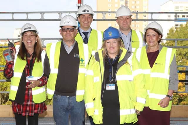 (L-r) Cllr Jennie Brent, site manager Steven Zaffarese, director of property and housing James Hill, council leader Donna Jones and project managers Adrian Legg and Beverley Murphy      Pictures: Habibur Rahman