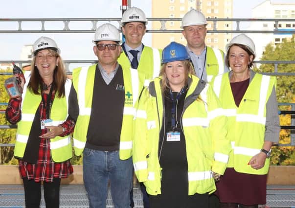 (L-r) Cllr Jennie Brent, site manager Steven Zaffarese, director of property and housing James Hill, council leader Donna Jones and project managers Adrian Legg and Beverley Murphy      Pictures: Habibur Rahman