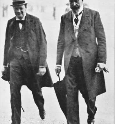 Winston Churchill and Prince Louis of Battenberg crossing Horseguards Parade, London.