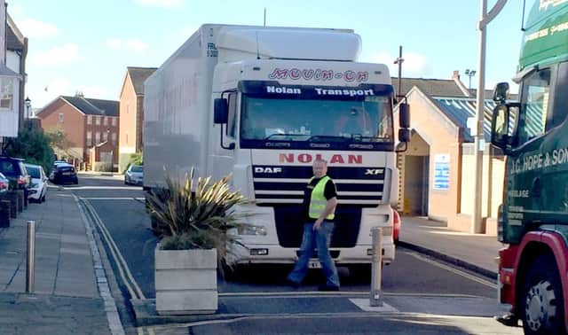 Lorry stuck by the bollards