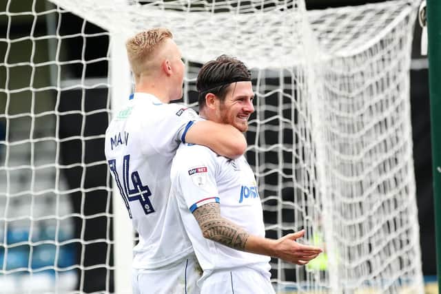 Matt Kennedy celebrates his winner at Priestfield Stadium with Curtis Main