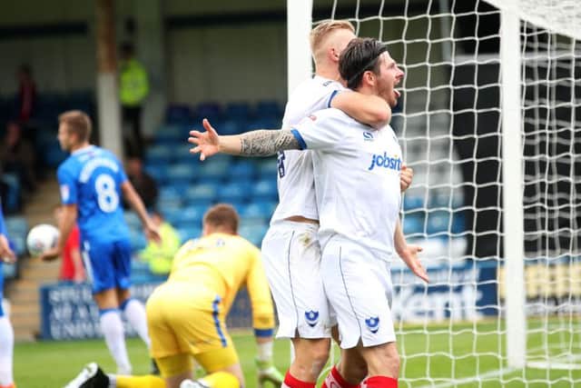 Matty Kennedy celebrates after netting at Gillingham. Picture: Joe Pepler