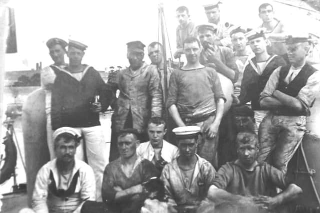 Sailors from HMS Chamois after coaling ship.
