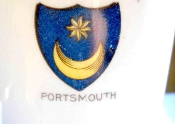 The reverse of the mug displaying the citys crest.
