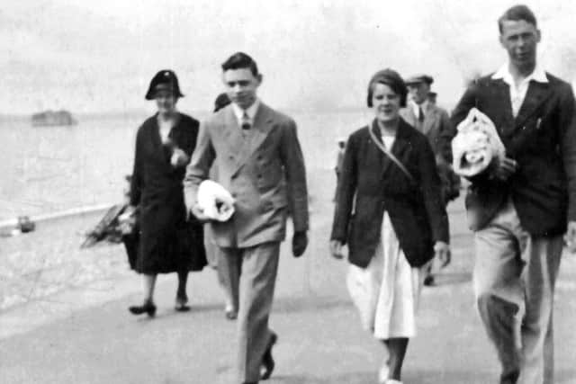 A family group on Southsea prom in the days before jeans, T-shirts and trainers