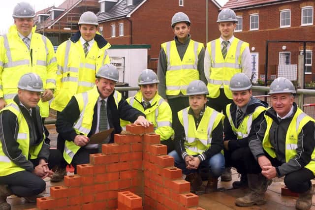 Barratt Homes apprentices with chief executive David Thomas and Anthony Dimmick