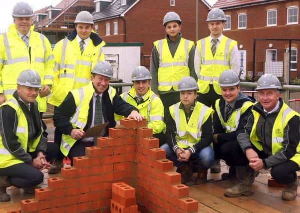 Barratt Homes apprentices with chief executive David Thomas and Anthony Dimmick