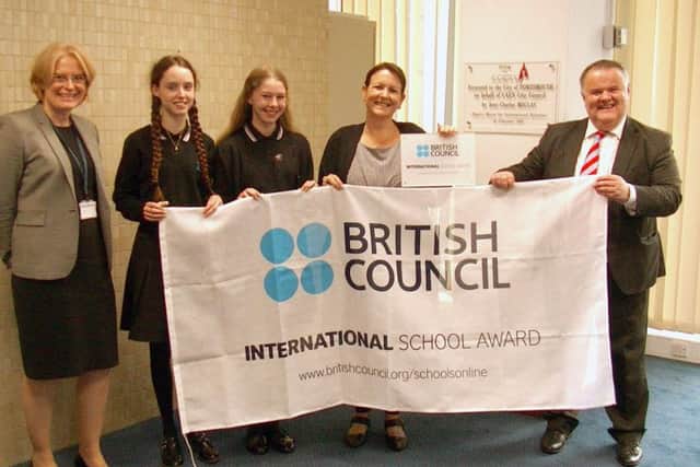 Alison Jeffery, director of childrens services at Portsmouth City Council, Ella Fitzgerald, ALNS pupil, Charlotte Coqueral, ALNS pupil, Julia Firth, ALNSs director of personal development and John Rolfe, international schools manager for the British Council
