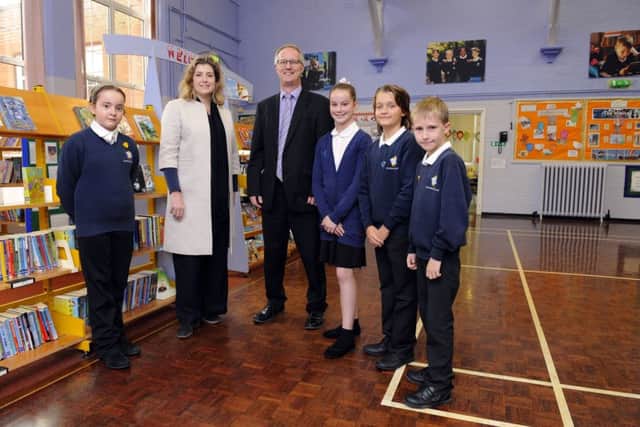 MP Penny Mordaint and headteacher  Iain Gilmour with, from left: deputy head girl Esther Court, head girl Cerys Dowley, head boy Joshua Stark, and deputy head boy Max Fitzgerald      Picture:  Malcolm Wells