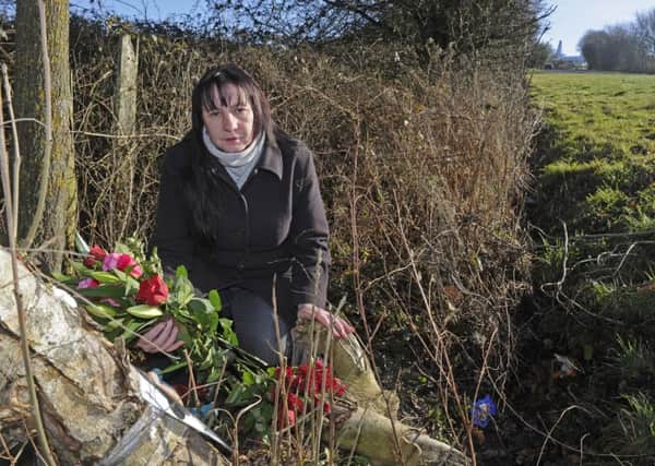 Sarah Hiscutt from Paulsgrove on the B2177 near Southwick where she has made a memorial to her son Luke who died in a car crash two years ago     
Picture Ian Hargreaves  (170056-1)