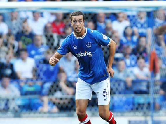 Christian Burgess returns to the Pompey side for his 100th outing.