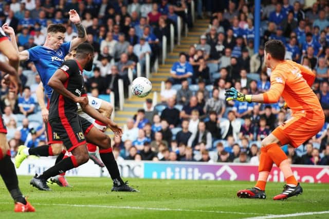 Oli Hawkins scores his second goal against MK Dons