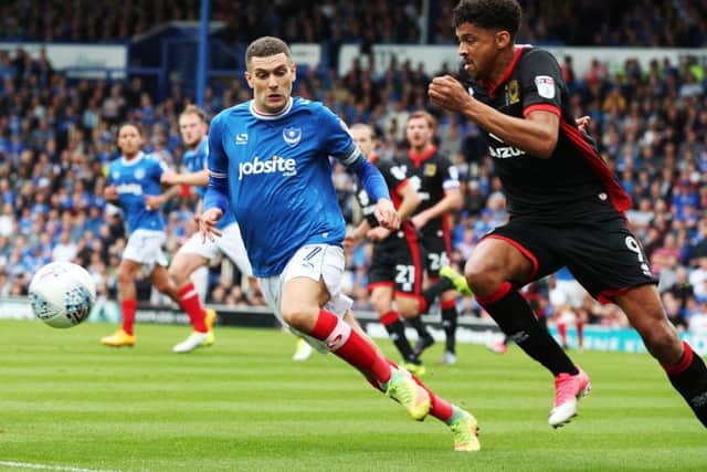 Stuart O'Keefe battles Osman Sow for the ball. Picture: Joe Pepler