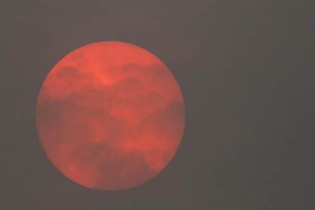 A red sun over Bromsgrove in Worcestershire. Picture: Neil Pugh