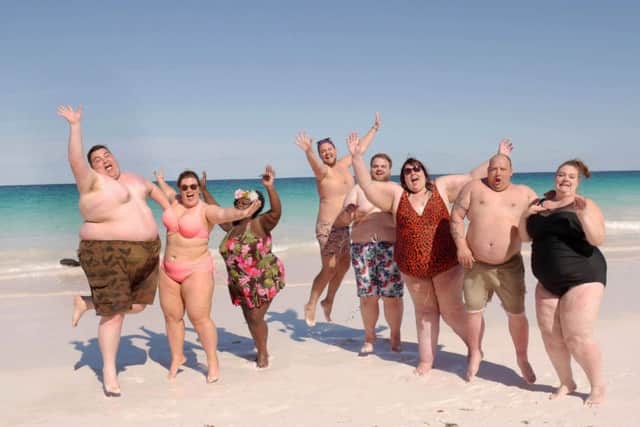 Pictured: (l-r) Steven, Holly, Sandra, David, Dane, Alice, Adam and Ami bare their bodies on the beach