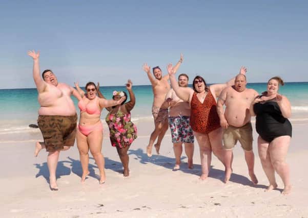 Pictured: (l-r) Steven, Holly, Sandra, David, Dane, Alice, Adam and Ami bare their bodies on the beach