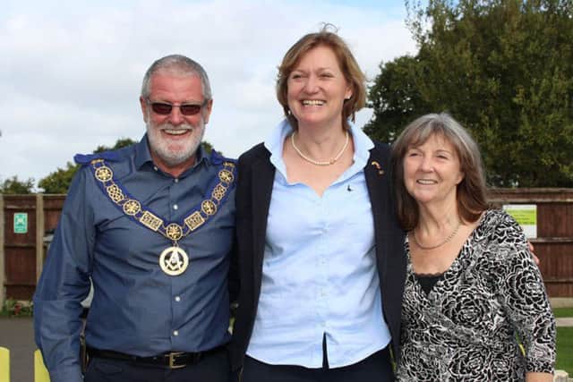 Michael and Kay Wilks with, centre,, Lara Bull, the CEO of the Rainbow Centre