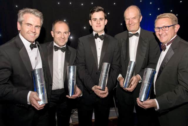 Winners proudly show off their property and construction awards. Picture: Huw Evans