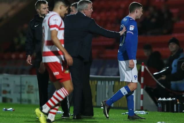 Dion Donohue heads to the changing rooms after his red card against Doncaster Rovers Picture: Paul Currie
