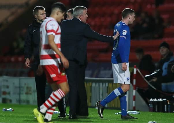Dion Donohue heads to the changing rooms after his red card against Doncaster Rovers Picture: Paul Currie