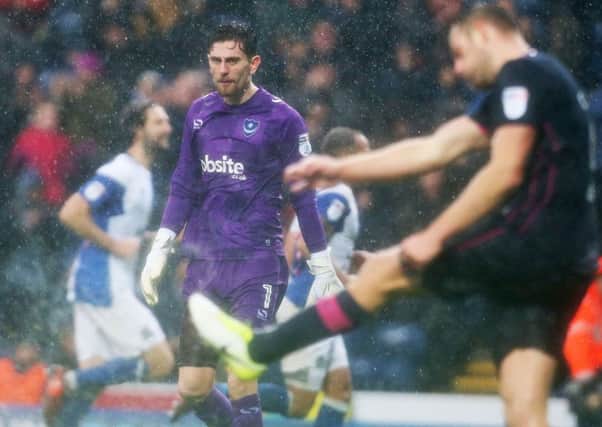 Pompey keeper Luke McGee endured a difficult afternoon at Ewood Park Picture: Joe Pepler