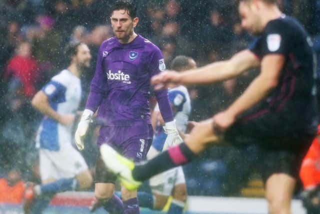 Pompey keeper Luke McGee endured a difficult afternoon at Ewood Park Picture: Joe Pepler